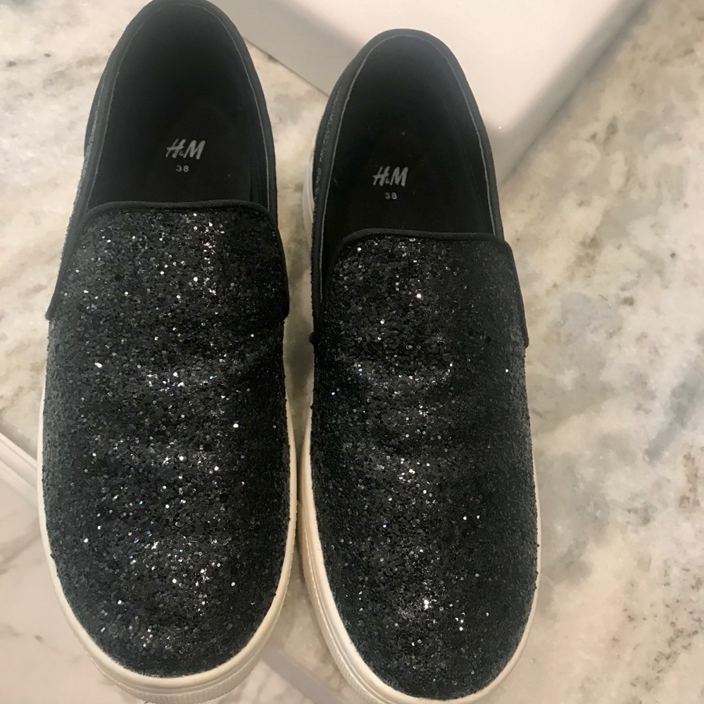 Sparkly black slip on sneakers. Never worn!!